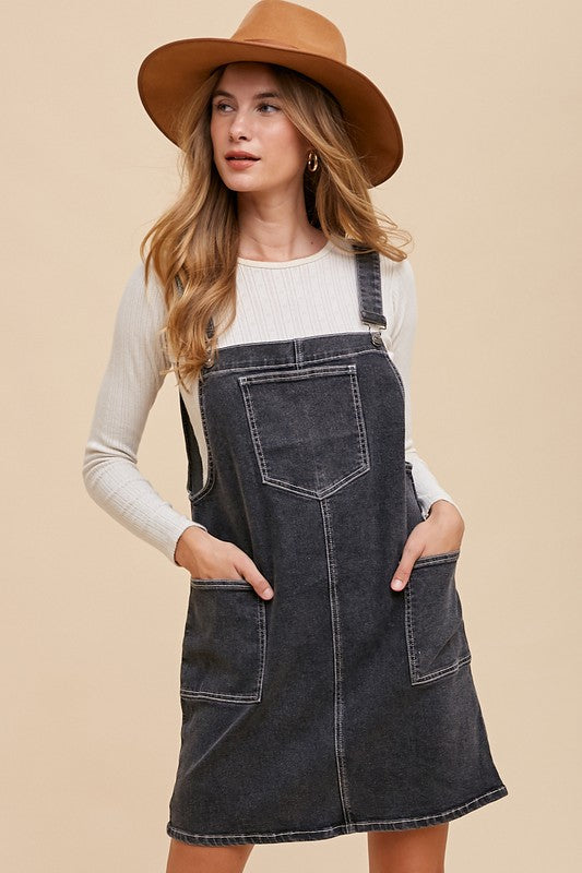 black denim overall dress 21902531_0b2f3877-9ec5-42c7-be86-7be357409873_800x.jpg?v=1729828261 the purple color will vary some by batch. Black Cotton Denim Overall Skirt